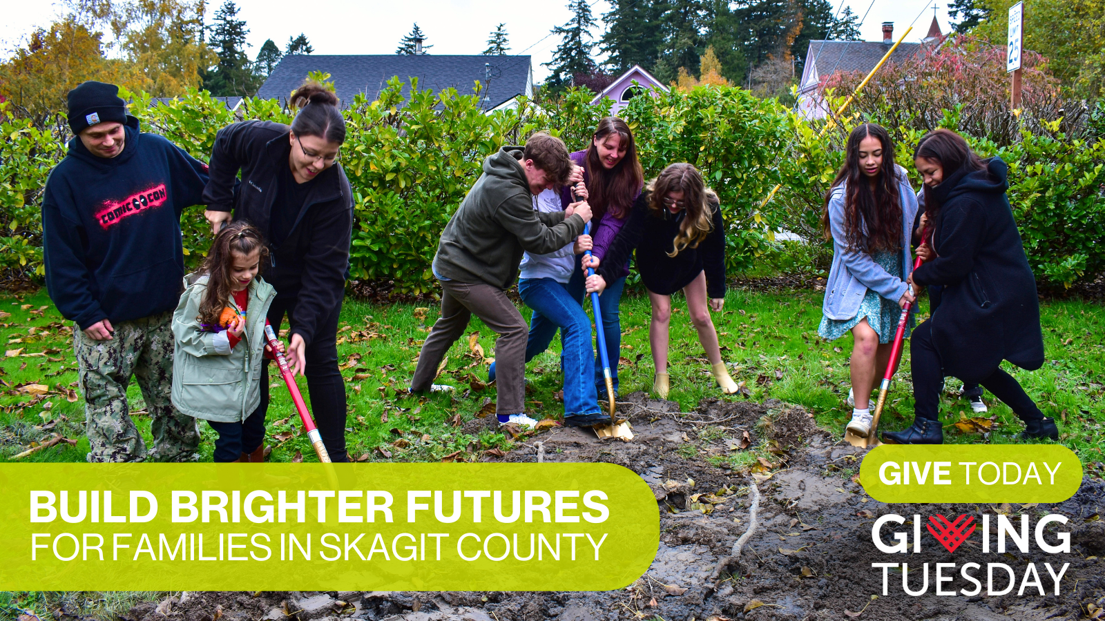 three families breaking ground in La Conner on the site of their future permanently affordable homes through Skagit Habitat for Humanity's Homebuyer Program. With a green text box that says build brighter futures for families in skagit county and give today