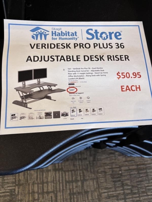 A paper product description for an item, Veridesk Pro Plus 36 adjustable desk riser. usually, $359, for sale for $50.95.