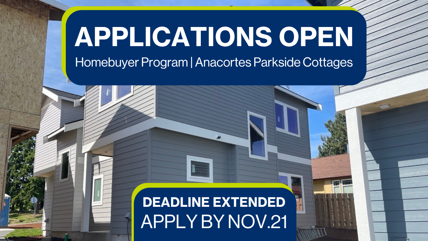Image of duplexes in Anacortes with complete exterior walls painted grey, part of Skagit Habitat for Humanity's Homebuyer Program. Text reads: Applications Open Homebuyer Program Anacortes Parkside Cottages. Deadline Extended: Apply by November 21